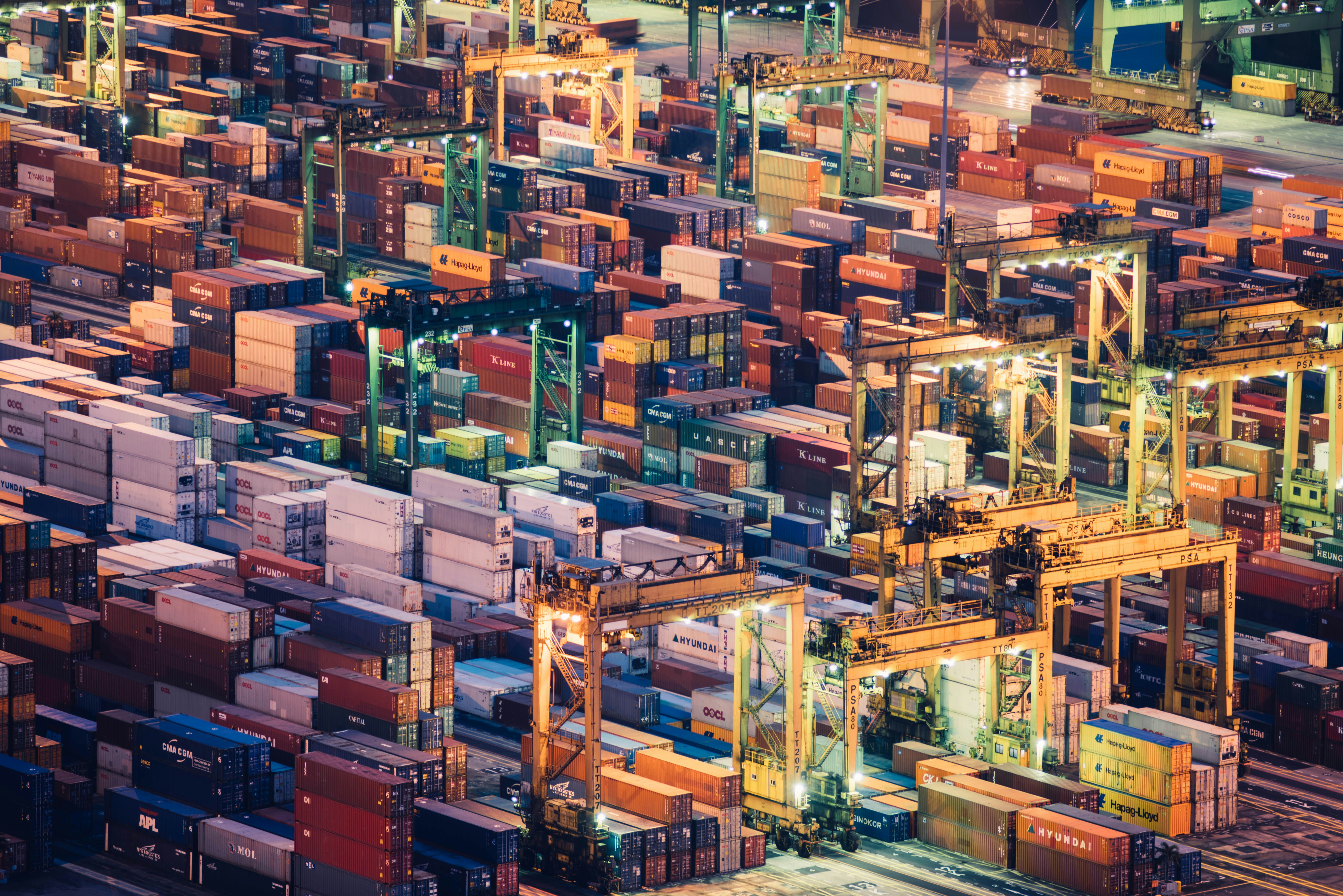 Container terminal illuminated at night, viewed from above