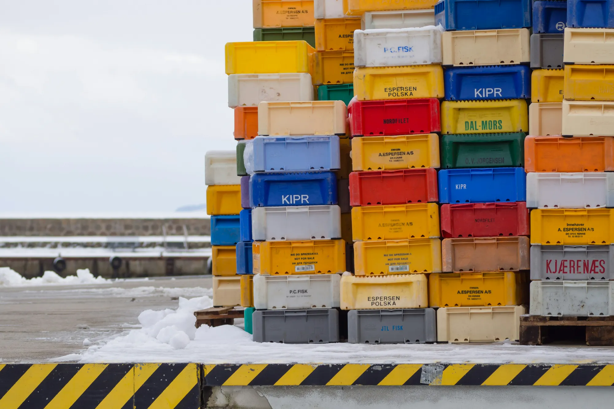 Crates at a protein processing dock, representing export trade
